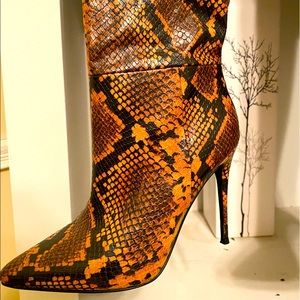 Orange knee-high boots